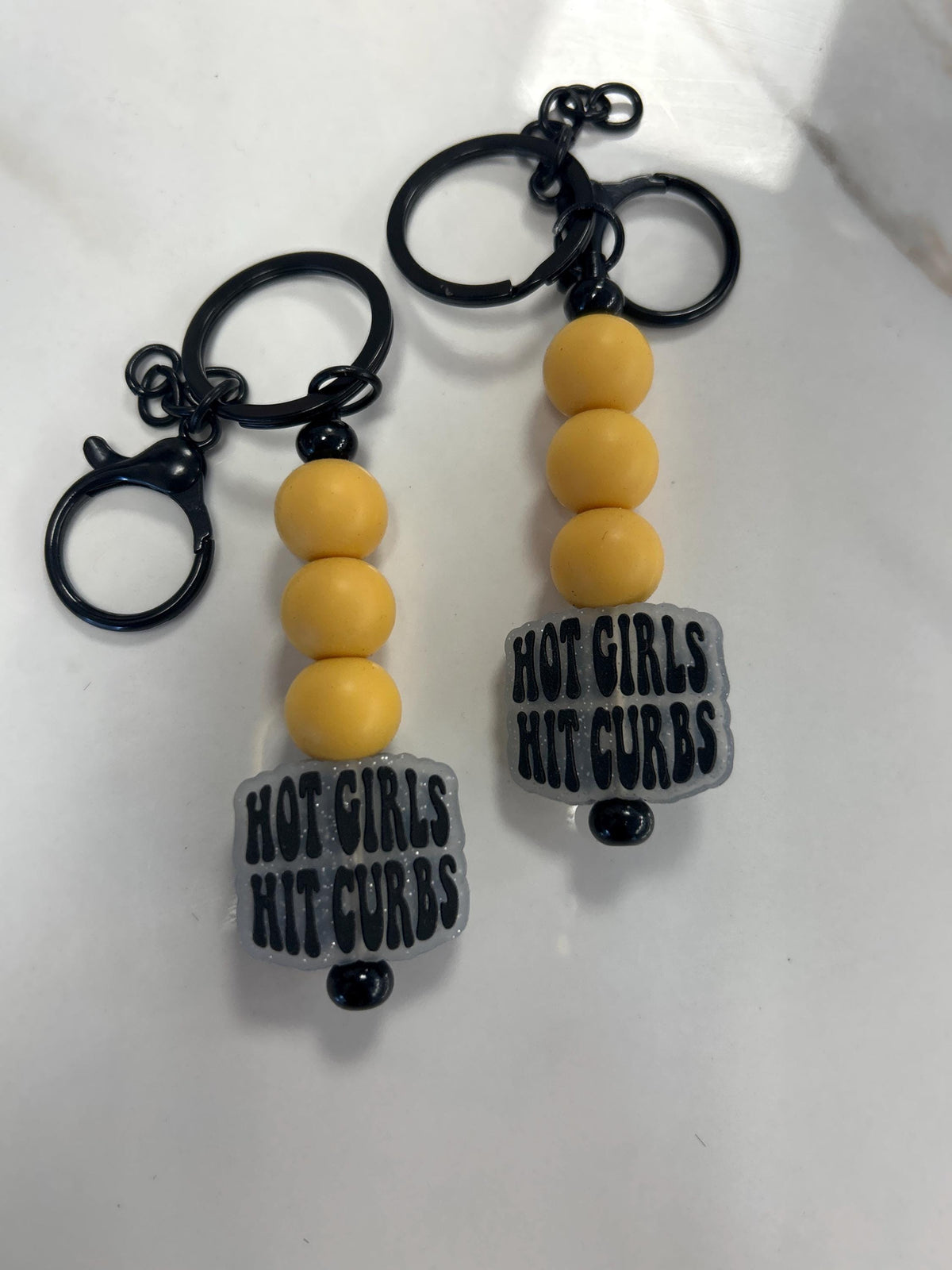Hot Girls Hit Curbs Keychain