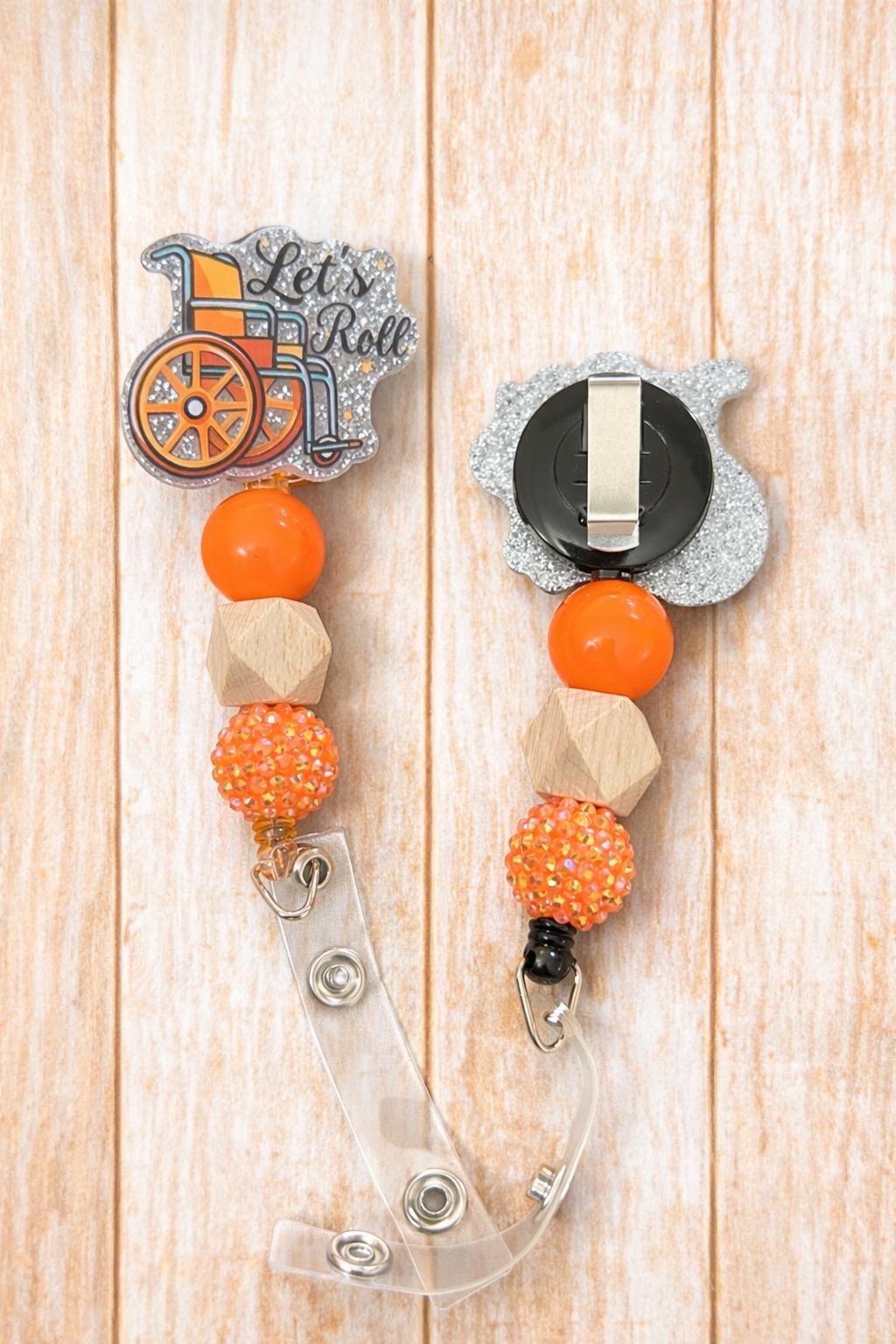 Let’s Roll Wheelchair Badge Reel